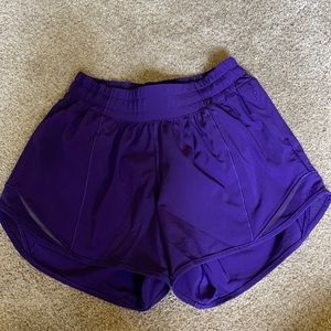 Purple lululemon hotty hot short 4”